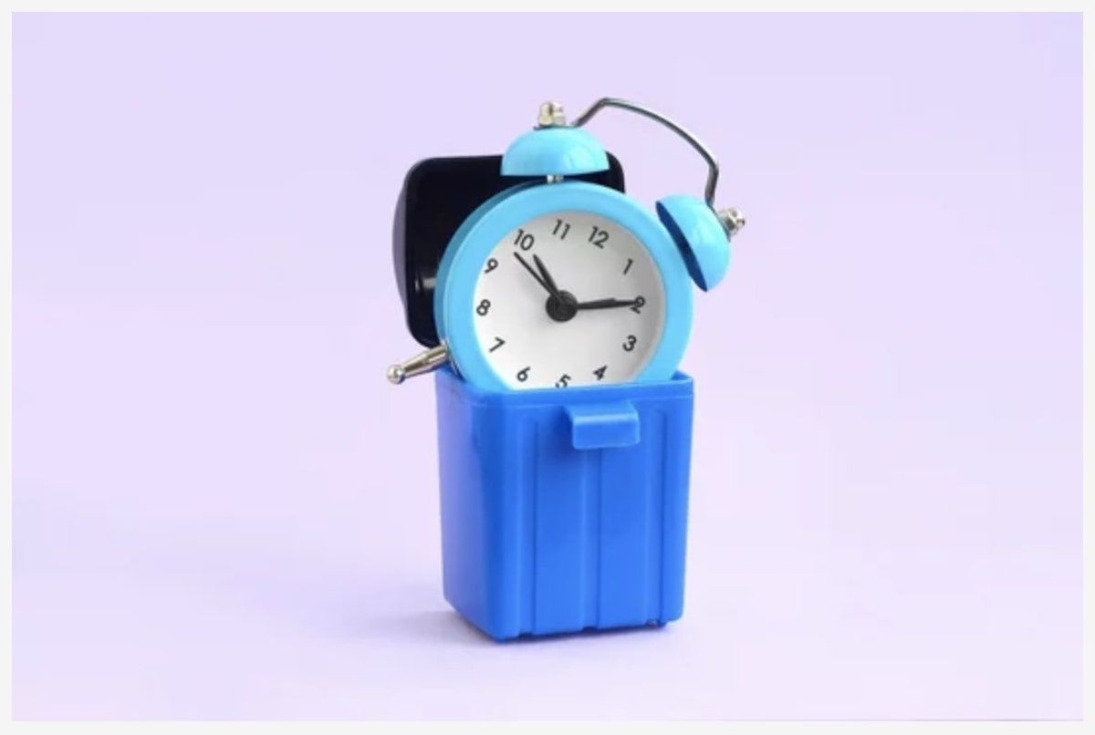Poor time management: alarm clock in a bin