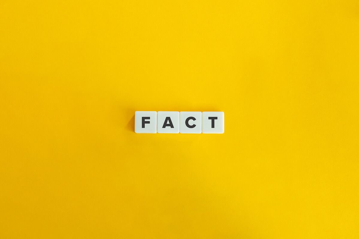 FACT spelled using letter tiles