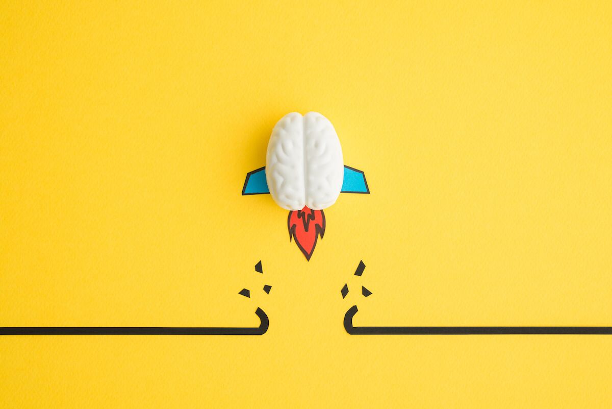 What is abstract thinking: model of a brain rocket on a yellow background